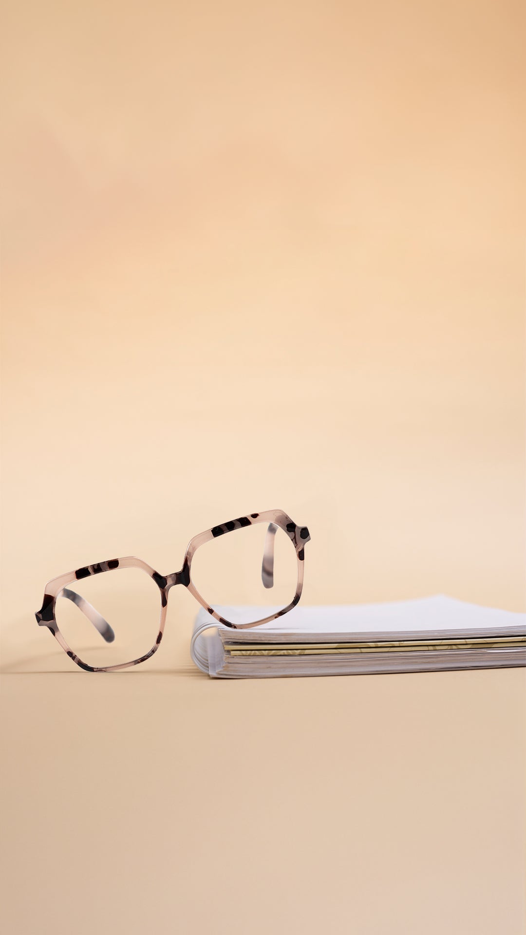 Square beige reading glasses with tortoiseshell pattern